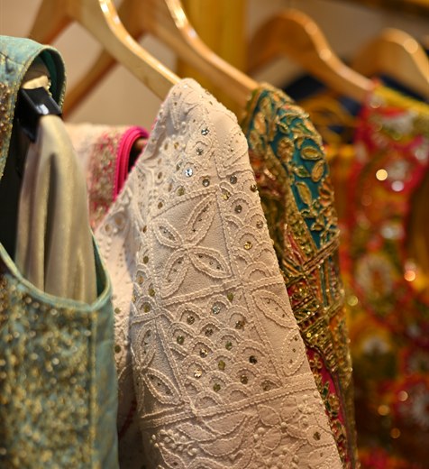 A close view of hand-beaded and chikankari work on the hanger
